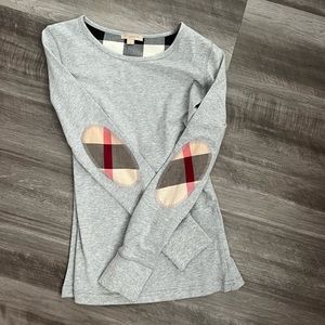 Woman’s Burberry long sleeve shirt
